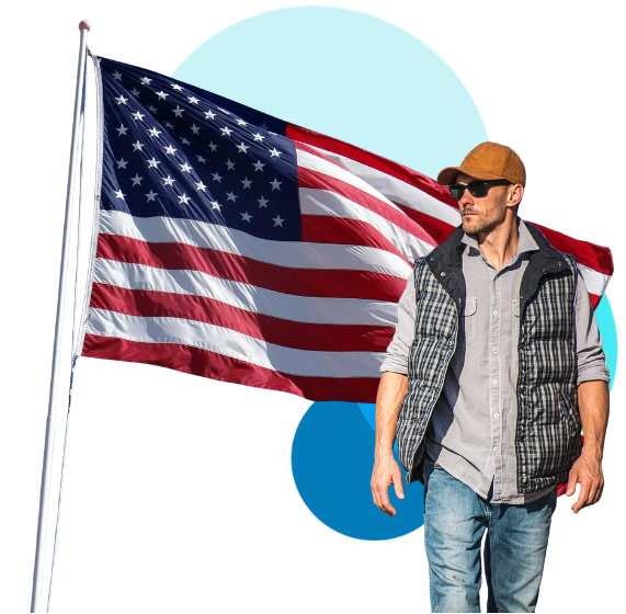 Alabama Freight Factoring for Truckers with American Flag Trucker standing in front of American flag representing Alabama freight factoring and fast funding for trucking companies