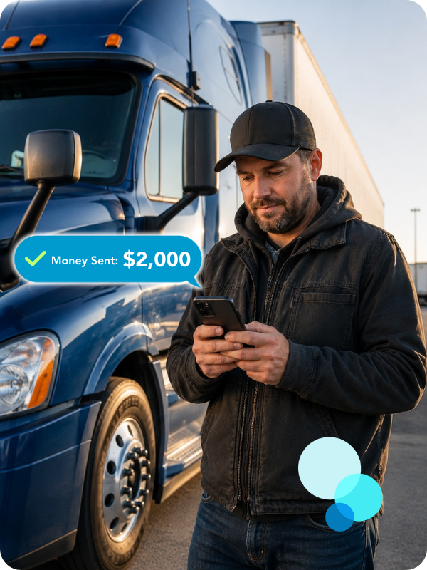 Truck driver standing beside a semi truck using a mobile phone and receiving a same-day freight factoring payment notification from Porter Freight Funding.